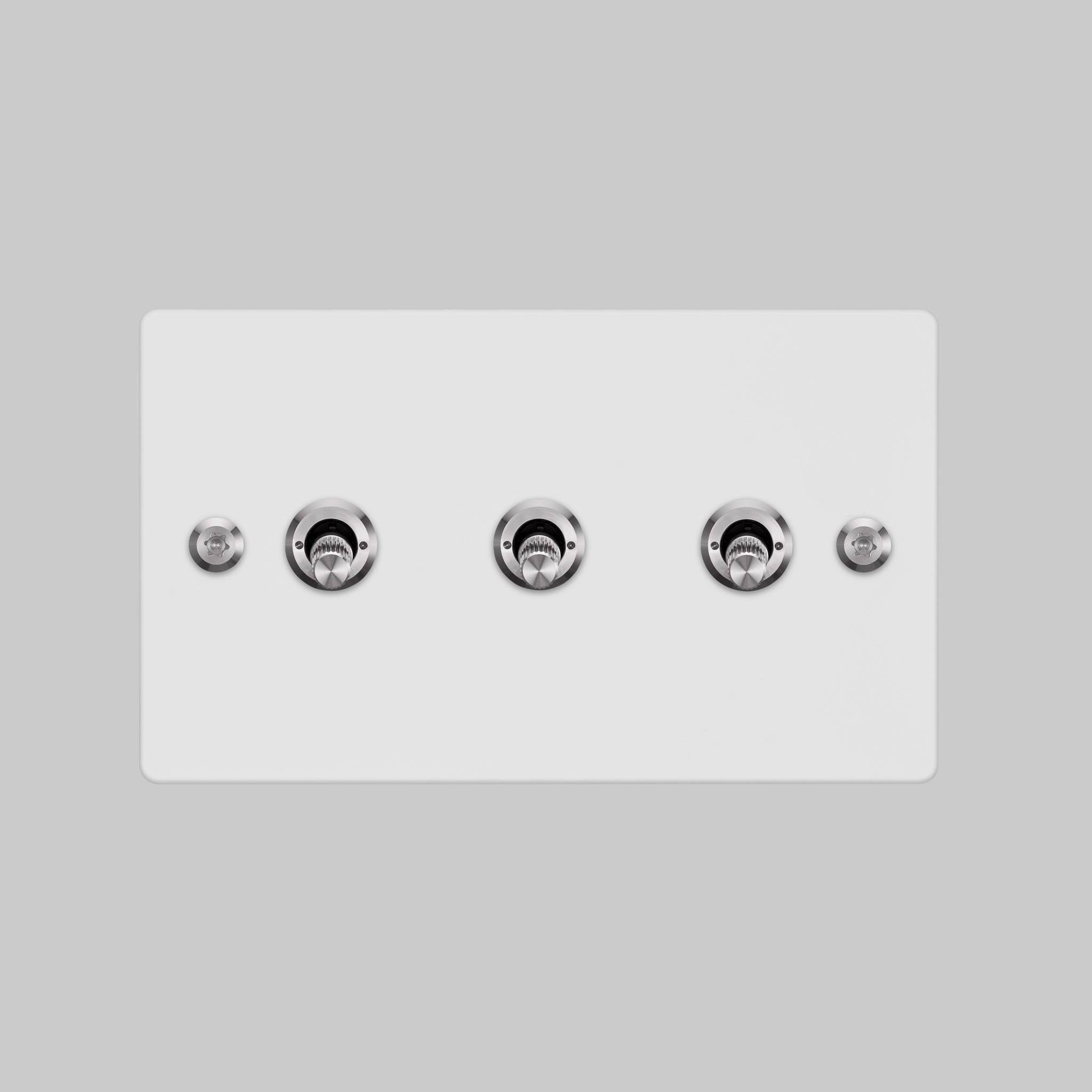 Buster + Punch 3G 2-way toggle switch, White plate with Steel linear knurl toggle arm, elevated angle