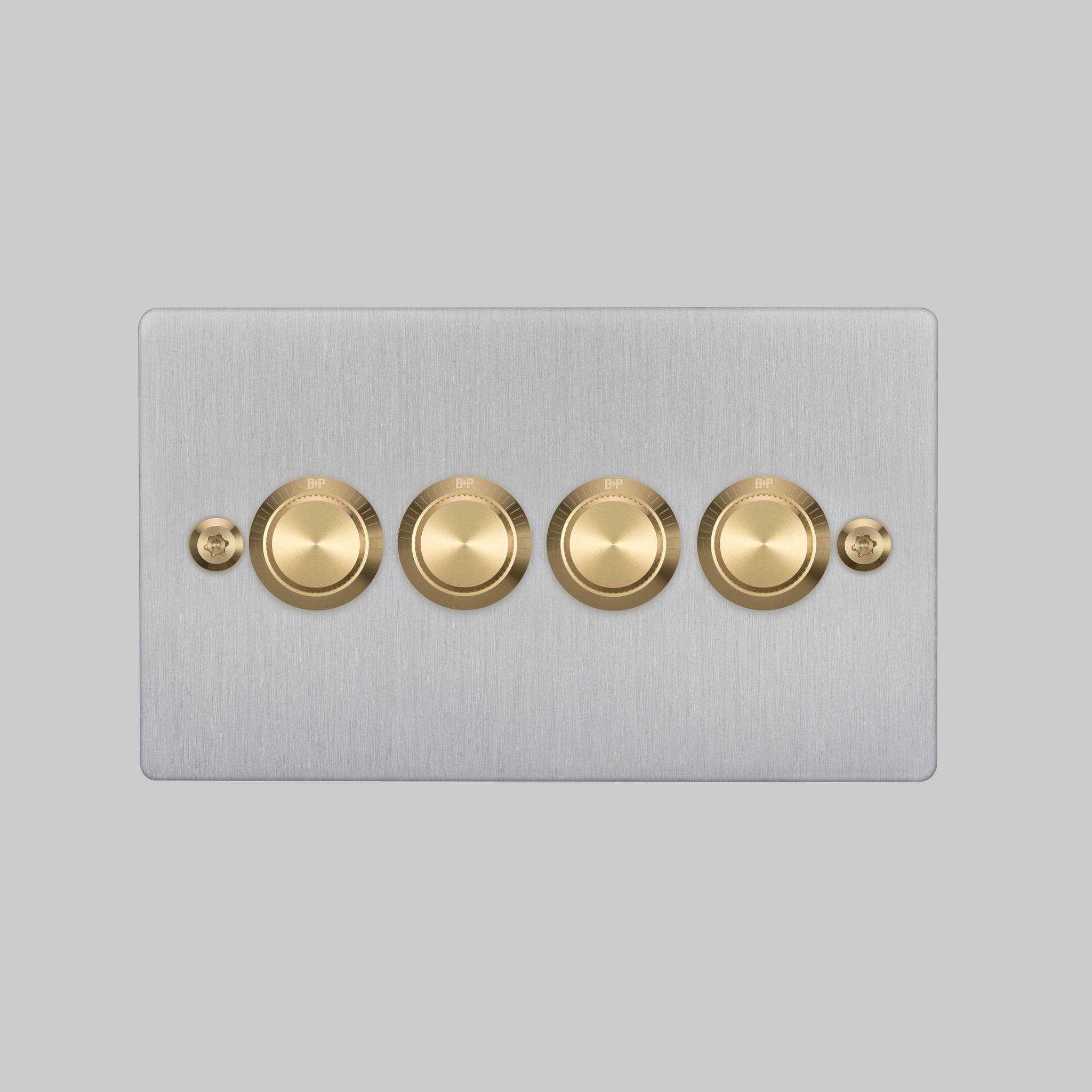Buster + Punch 4G dimmer switch, Steel plate with Brass linear knurl dimmer knob, elevated angle