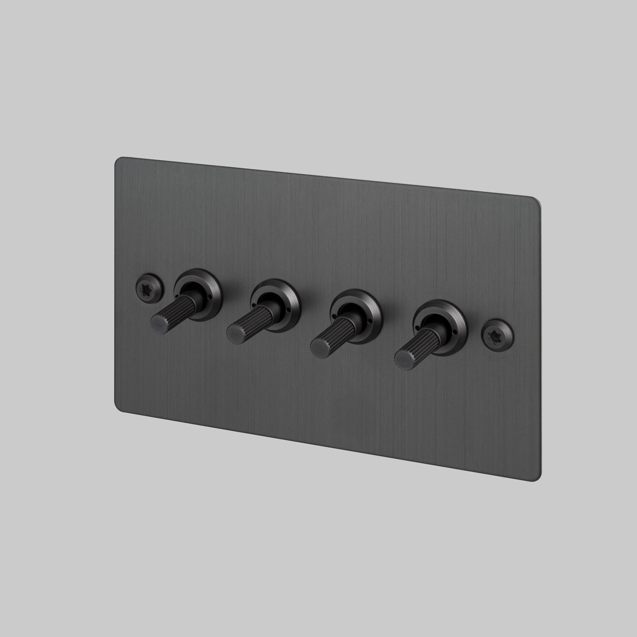 Buster + Punch 4G toggle switch, smoked bronze plate with smoked bronze linear knurl toggle arms, front view