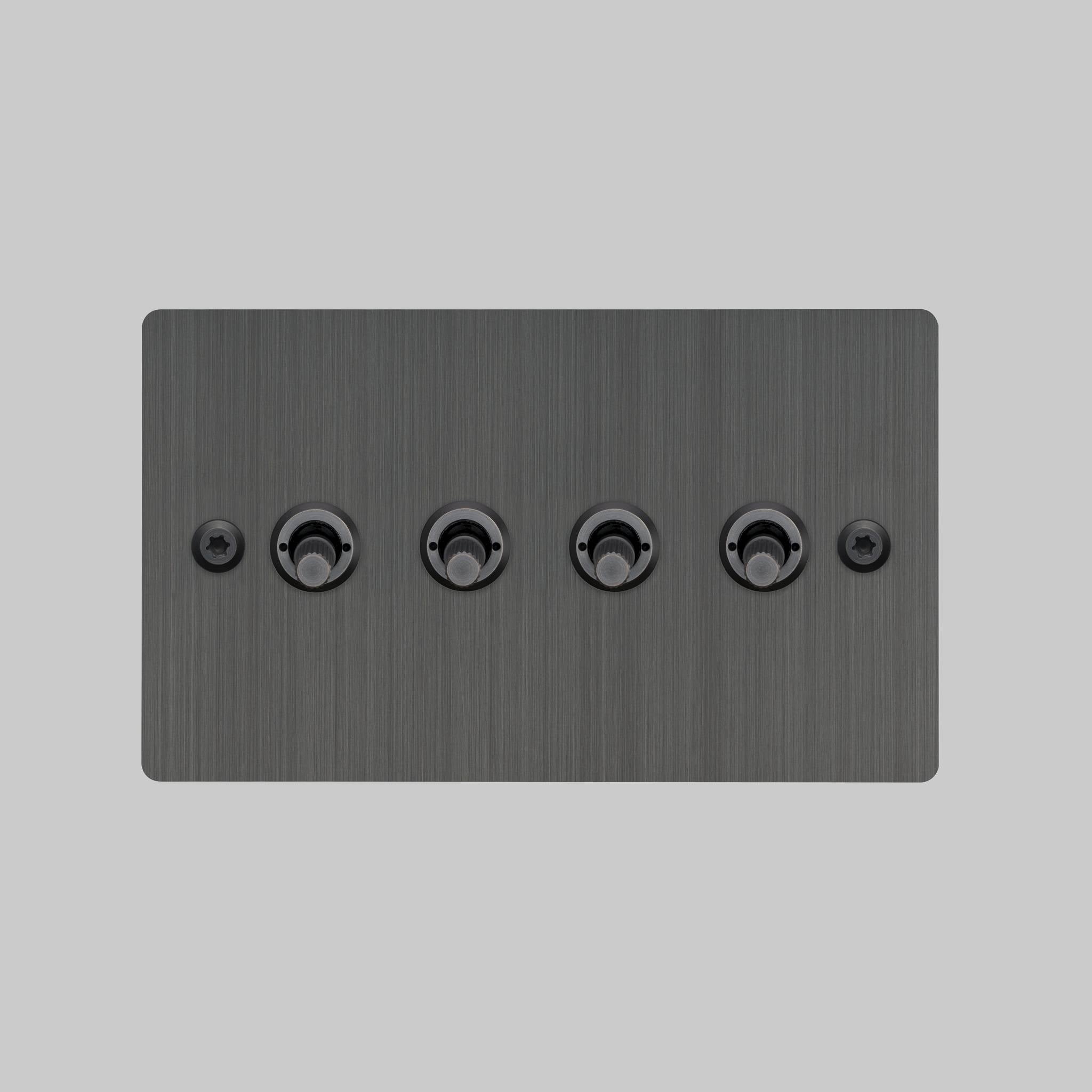 Buster + Punch 4G toggle switch, smoked bronze plate with smoked bronze linear knurl toggle arms, elevated angle view