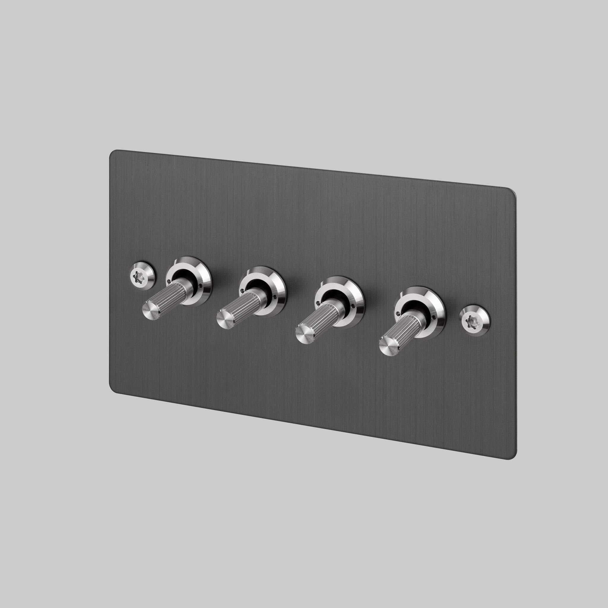 Buster + Punch 4G toggle switch, smoked bronze plate with steel linear knurl toggle arms, front view