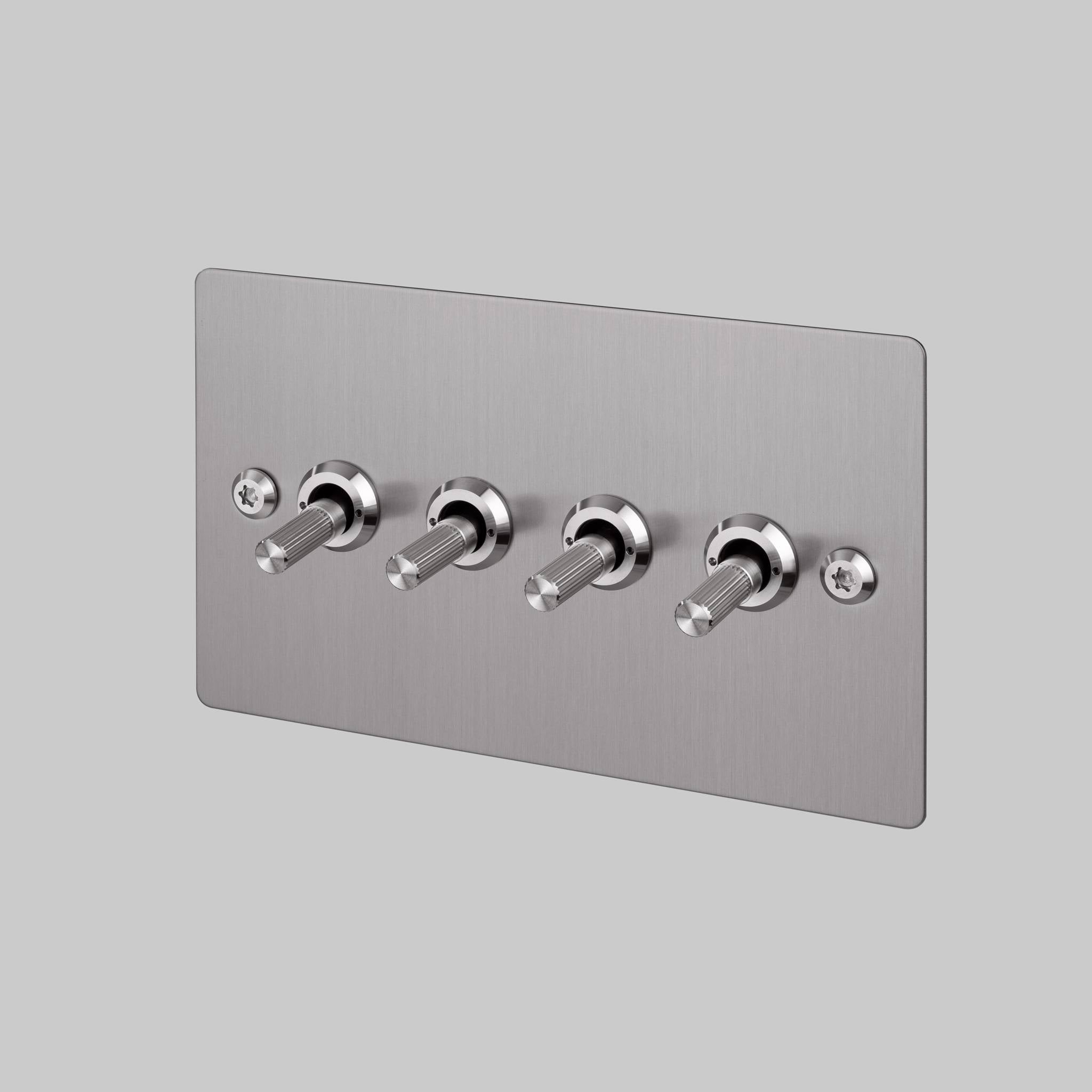 Buster + Punch 4G toggle switch, steel plate with steel linear knurl toggle arms, front view