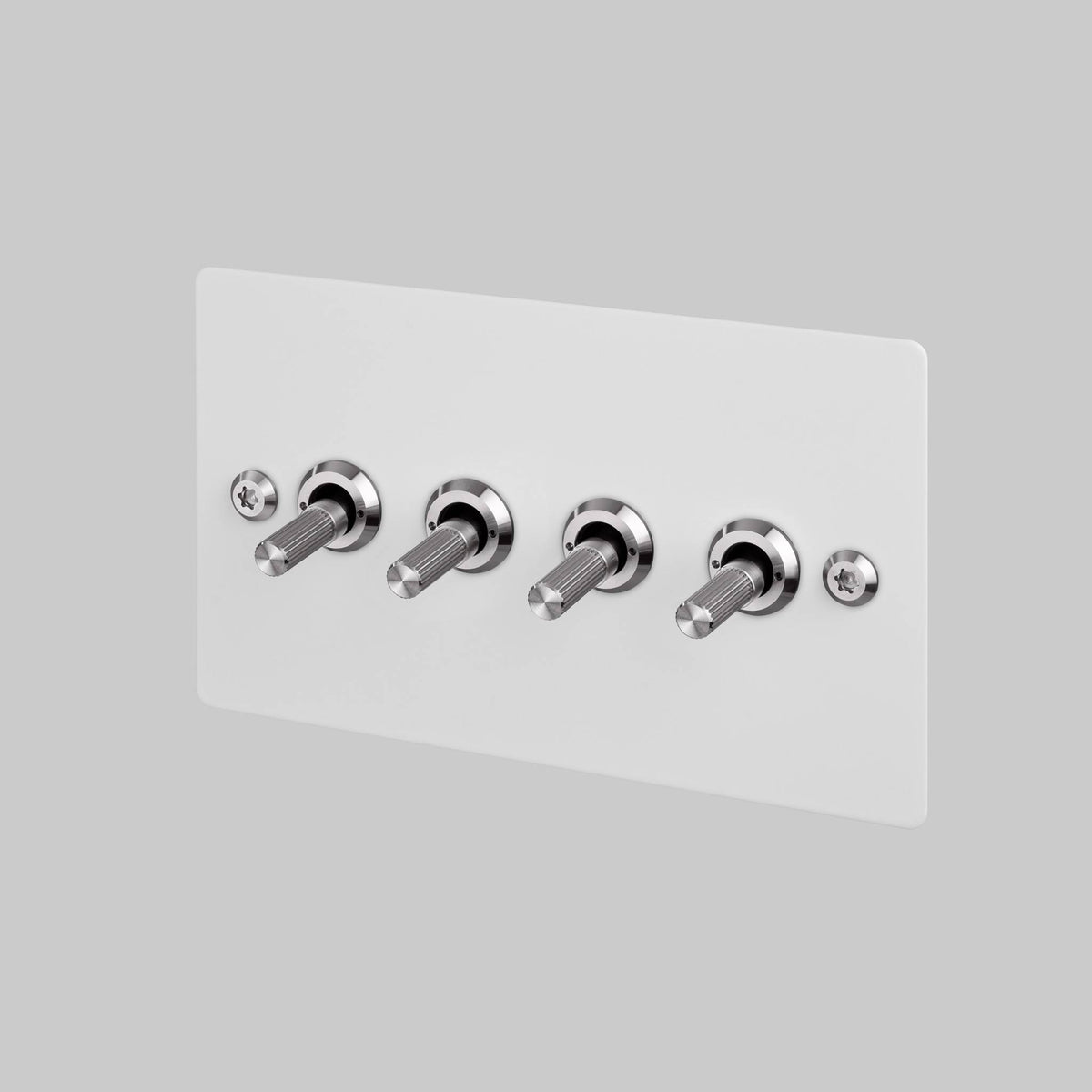 Buster + Punch 4G toggle switch, white plate with steel linear knurl toggle arms, front view