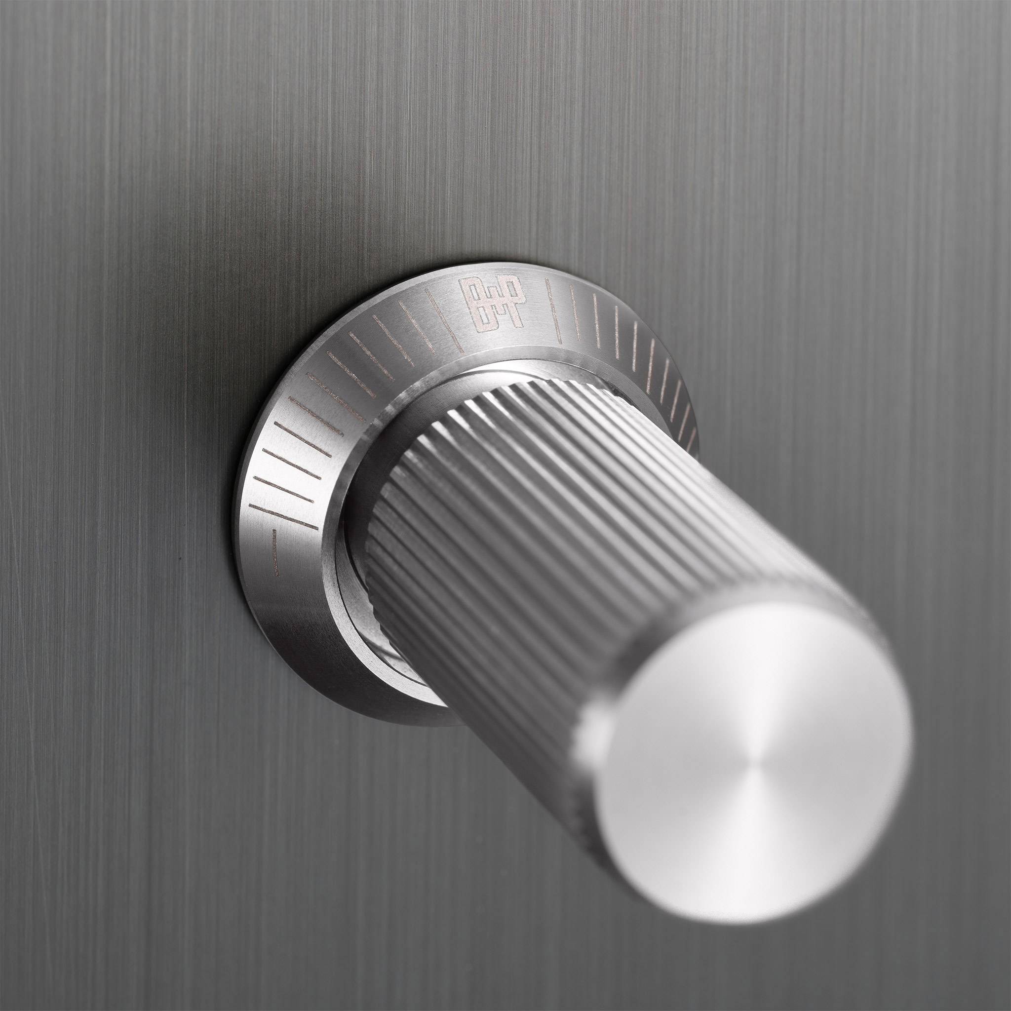 Buster + Punch 1G Dimmer switch, Smoked Bronze plate with Steel linear knurl knob, close up of the knurl detail