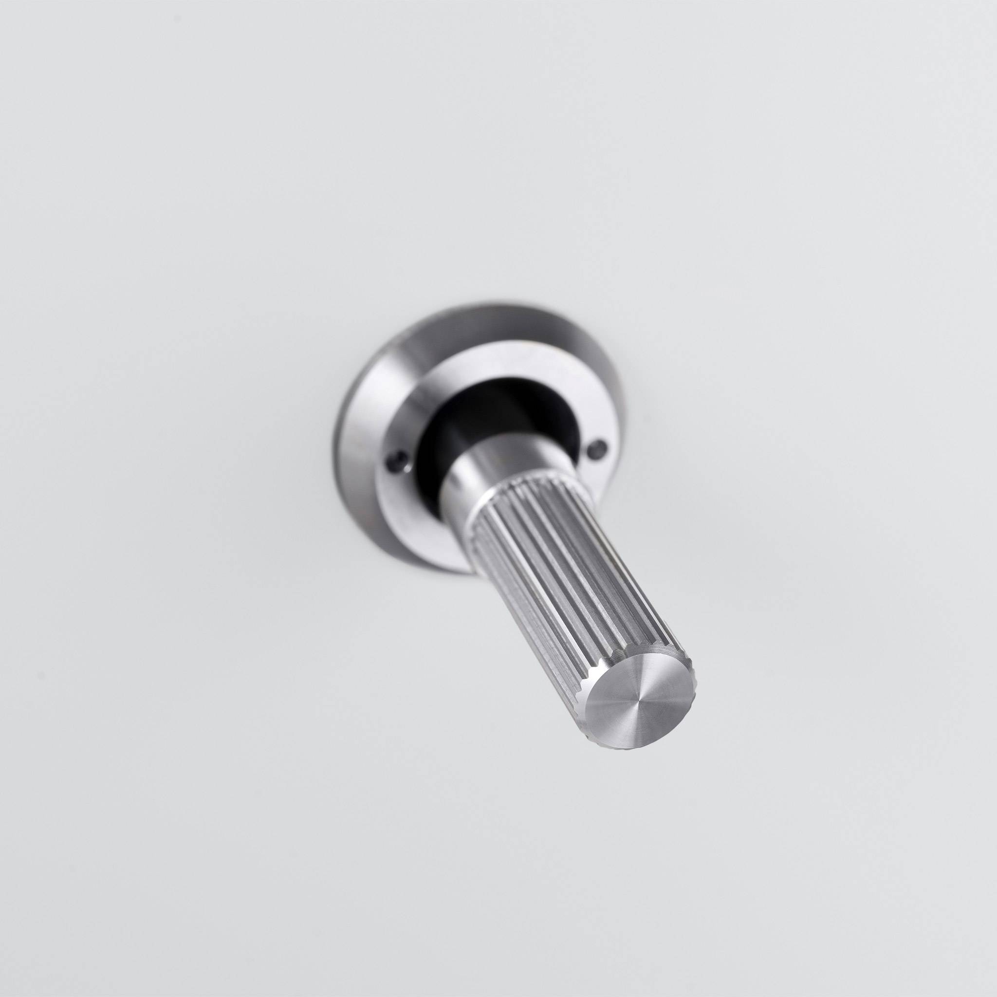 Buster + Punch 3G 2-way toggle switch, White plate with Steel linear knurl toggle arm, close up of the knurl detail