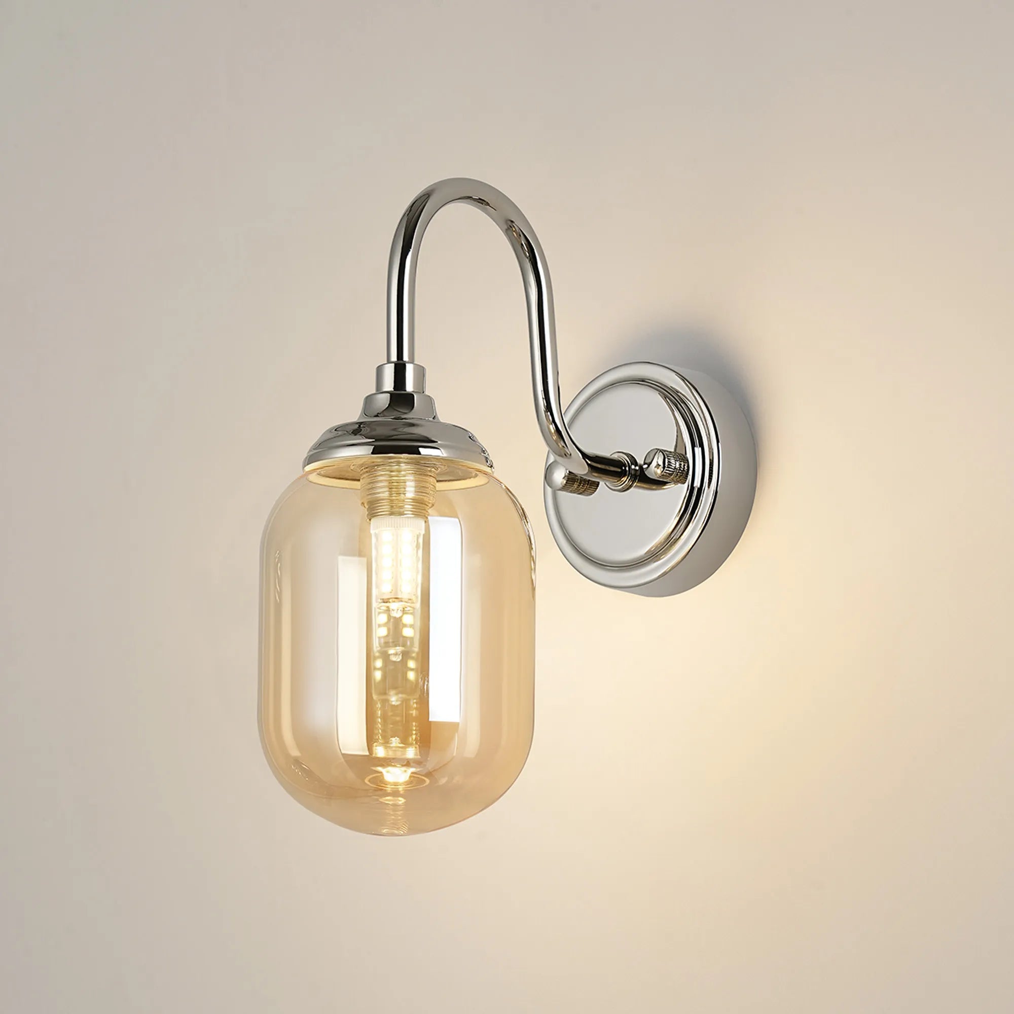 Dene Curved Arm Wall Light - 1 Light - IP44 Polished Nickel & Amber Smooth Tubular Glass