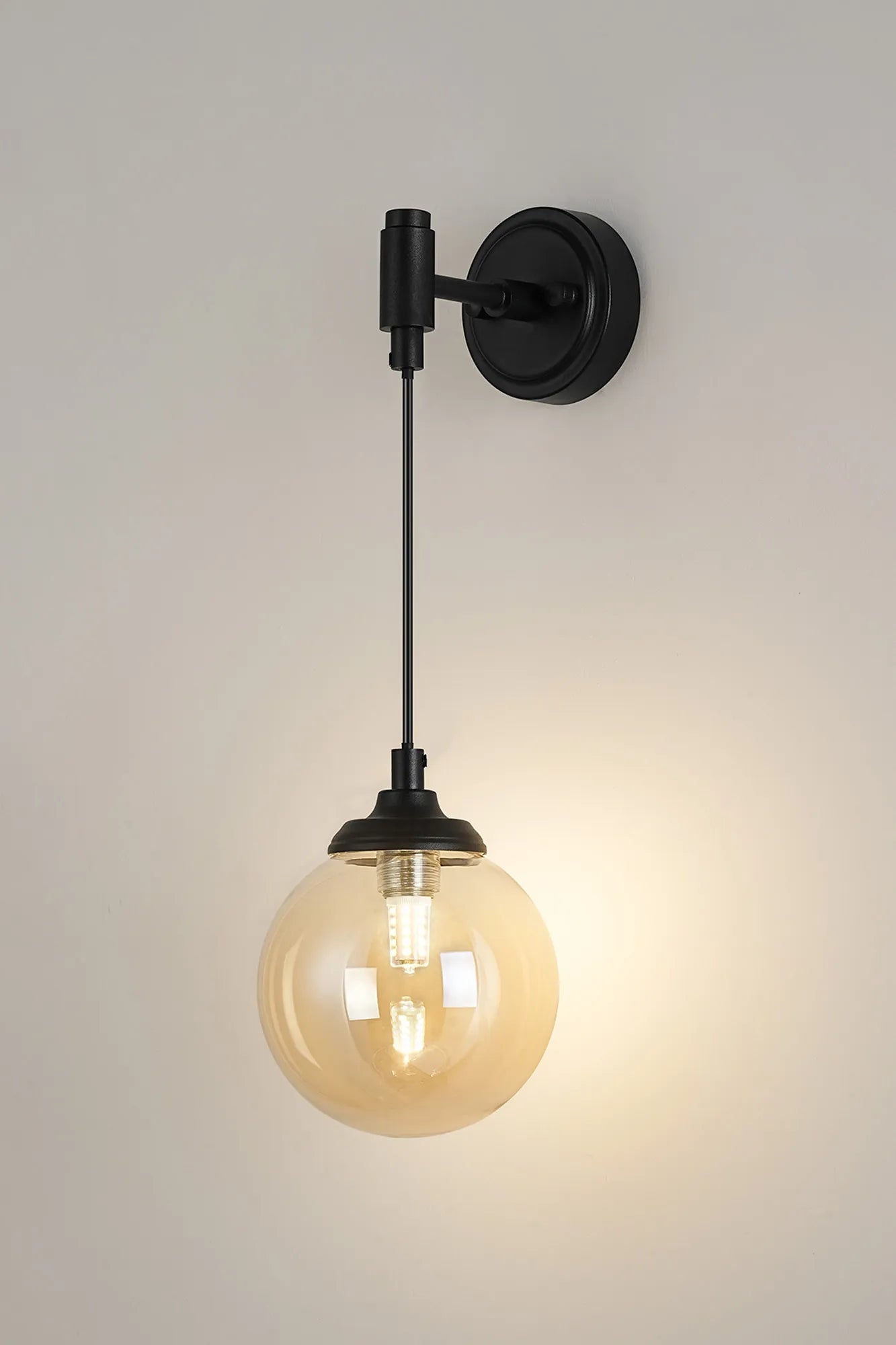 Dene Adjustable Single Wall Light IP44 - Satin Black & Amber Smooth Round Glass