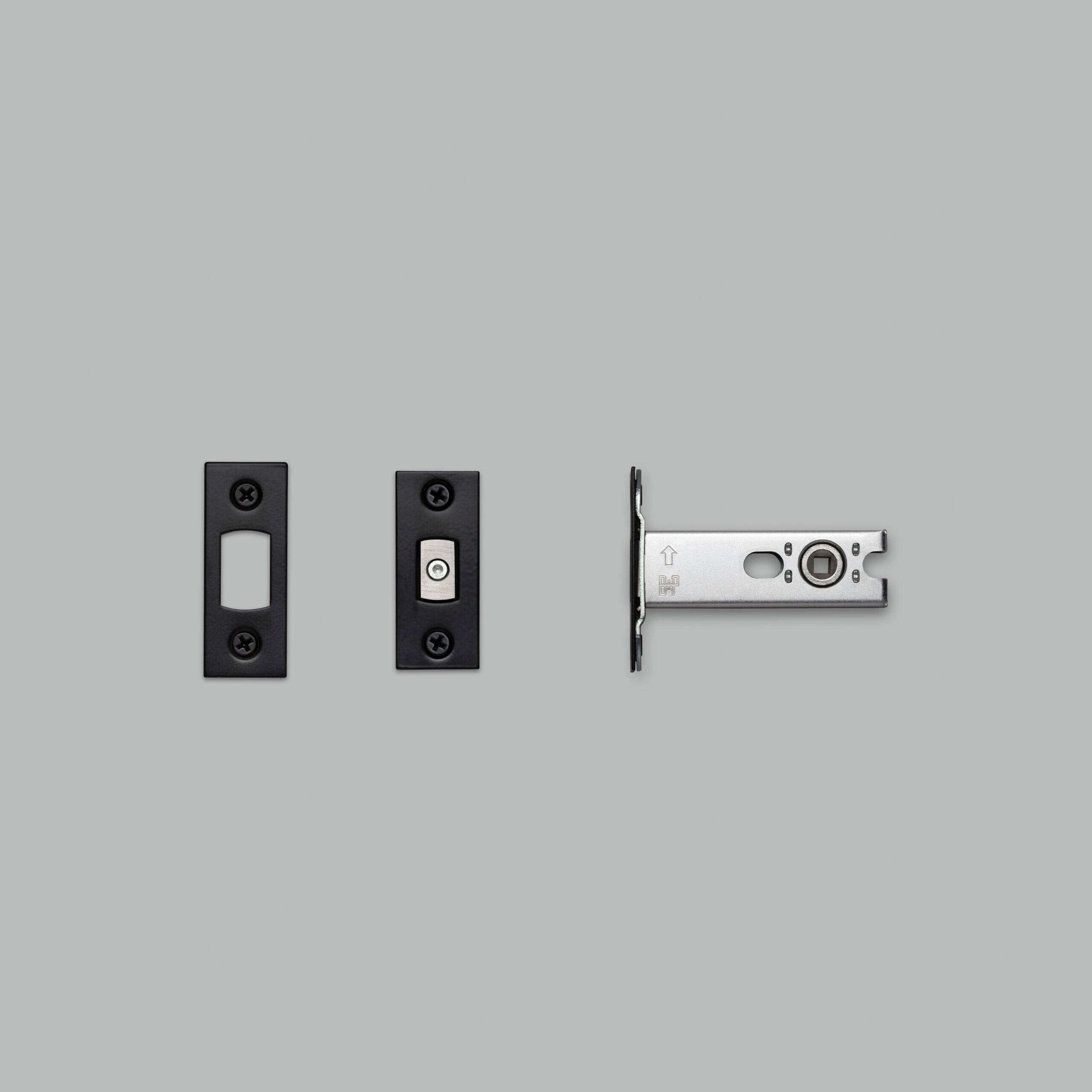 Black tubular deadbolt latch body, faceplate and strike plate for a 57mm backset thumbturn lock.