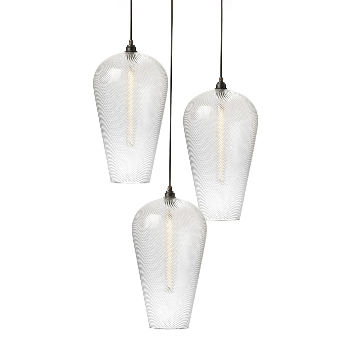 Leverint Waterloo cascade cluster of three large tapered clear twisted ribbed glass pendants at different heights with dark bronze toned lamp holders and black flex, studio shot on white