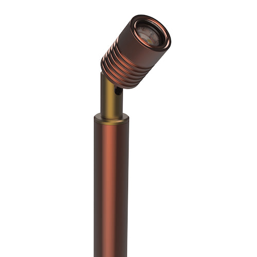 Close up of the ribbed copper spot head and brass neck of a LuxR Modux pole spot