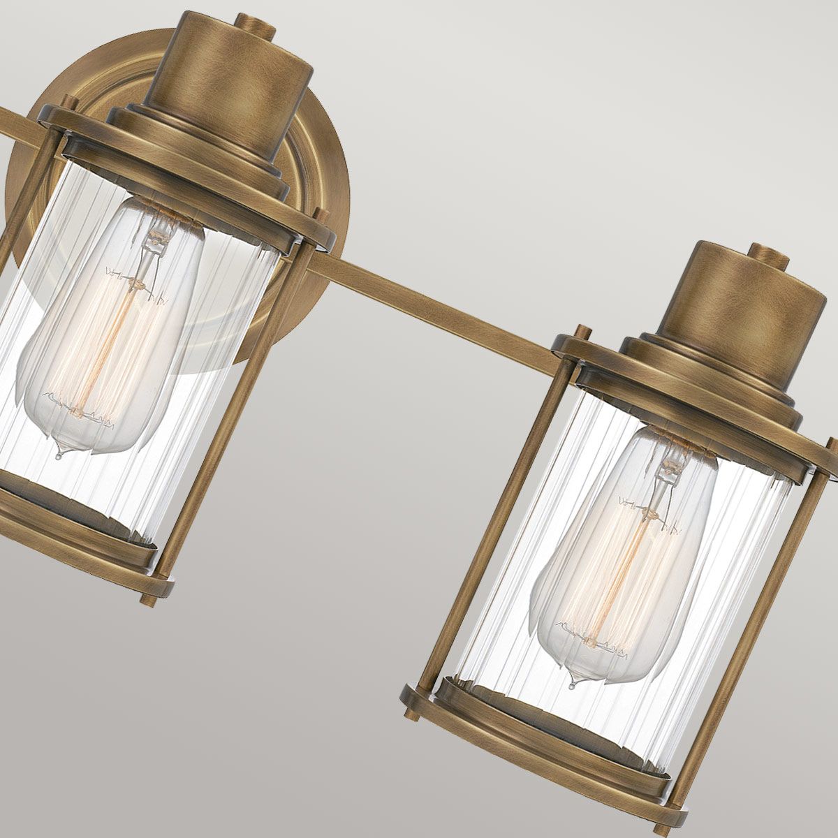 Quoizel Riggs 3 Light Bathroom Wall Light - Weathered Brass