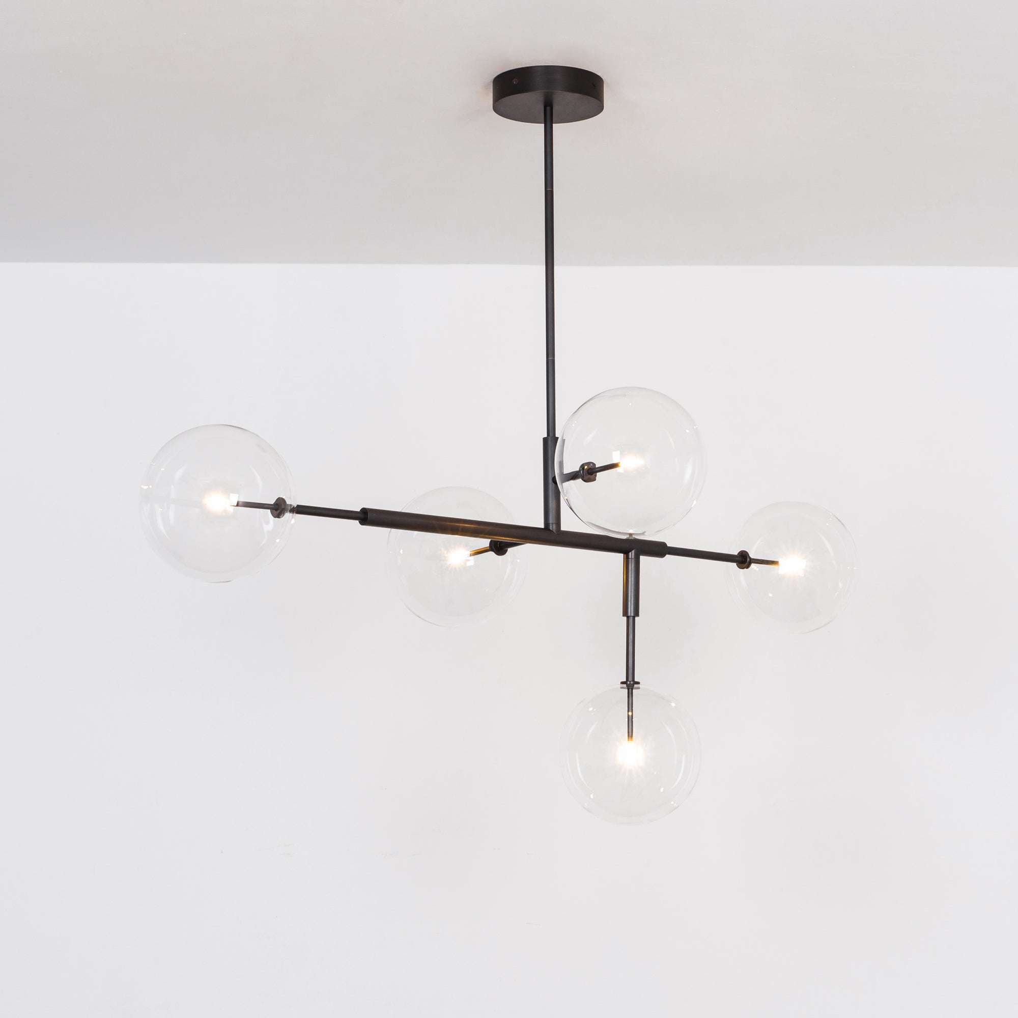 Schwung Axis 5 Light Chandelier - Transparent Glass