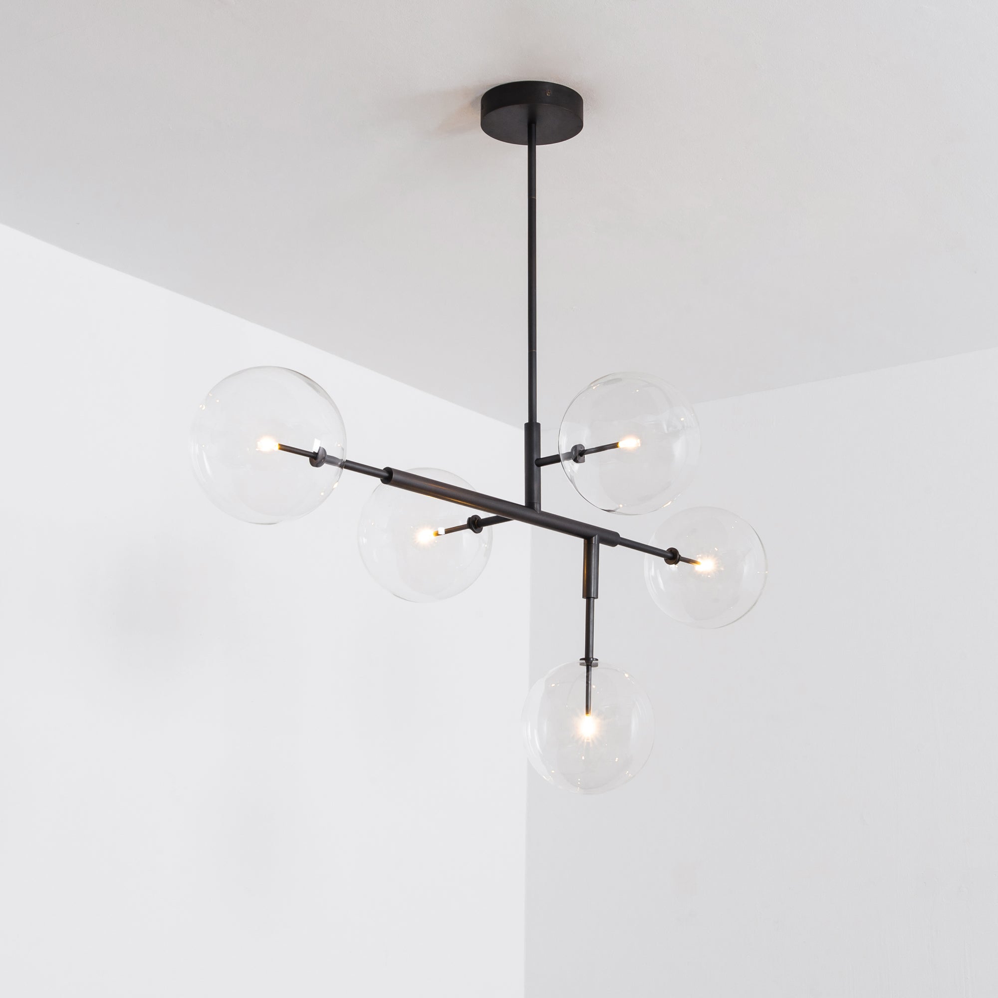 Schwung Axis 5 Light Chandelier - Transparent Glass