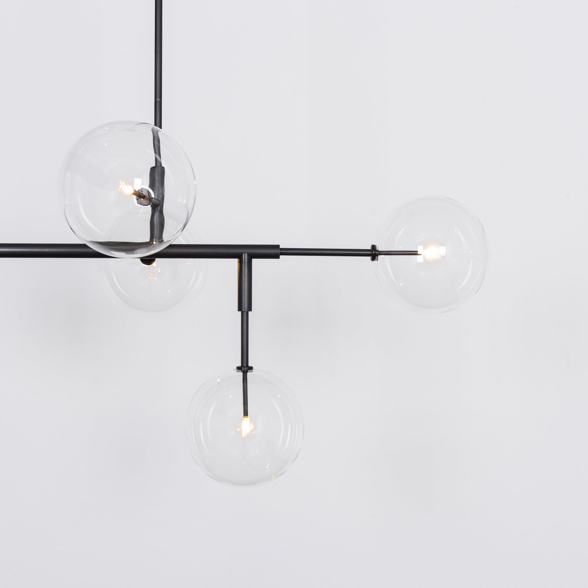 Schwung Axis 5 Light Chandelier - Transparent Glass